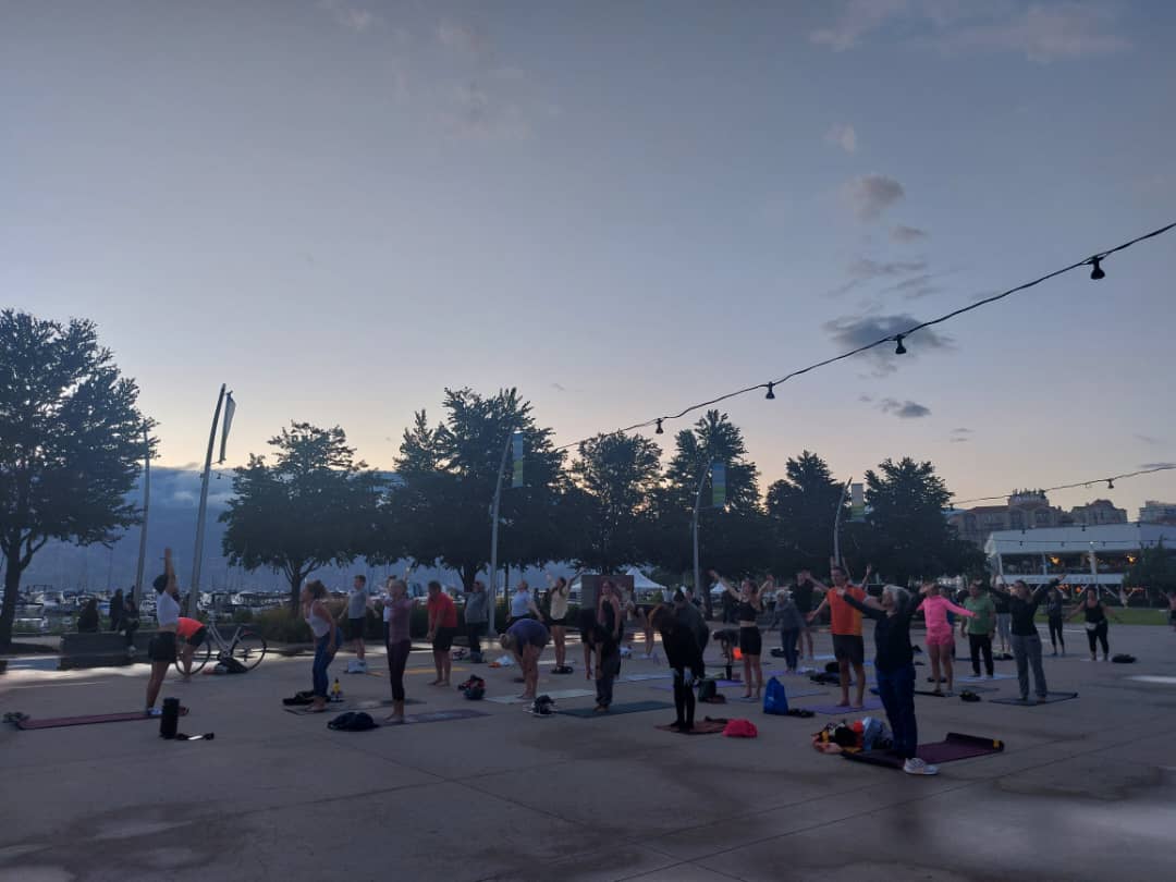 Community outdoor yoga at the park